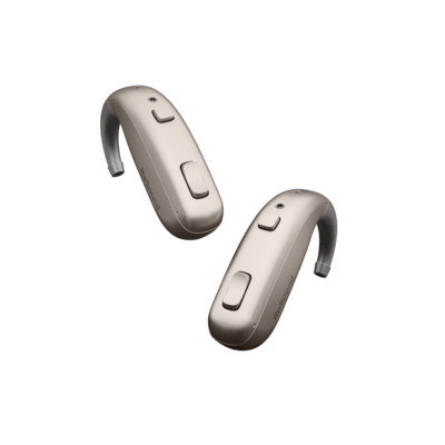 Two beige behind-the-ear hearing aids with buttons